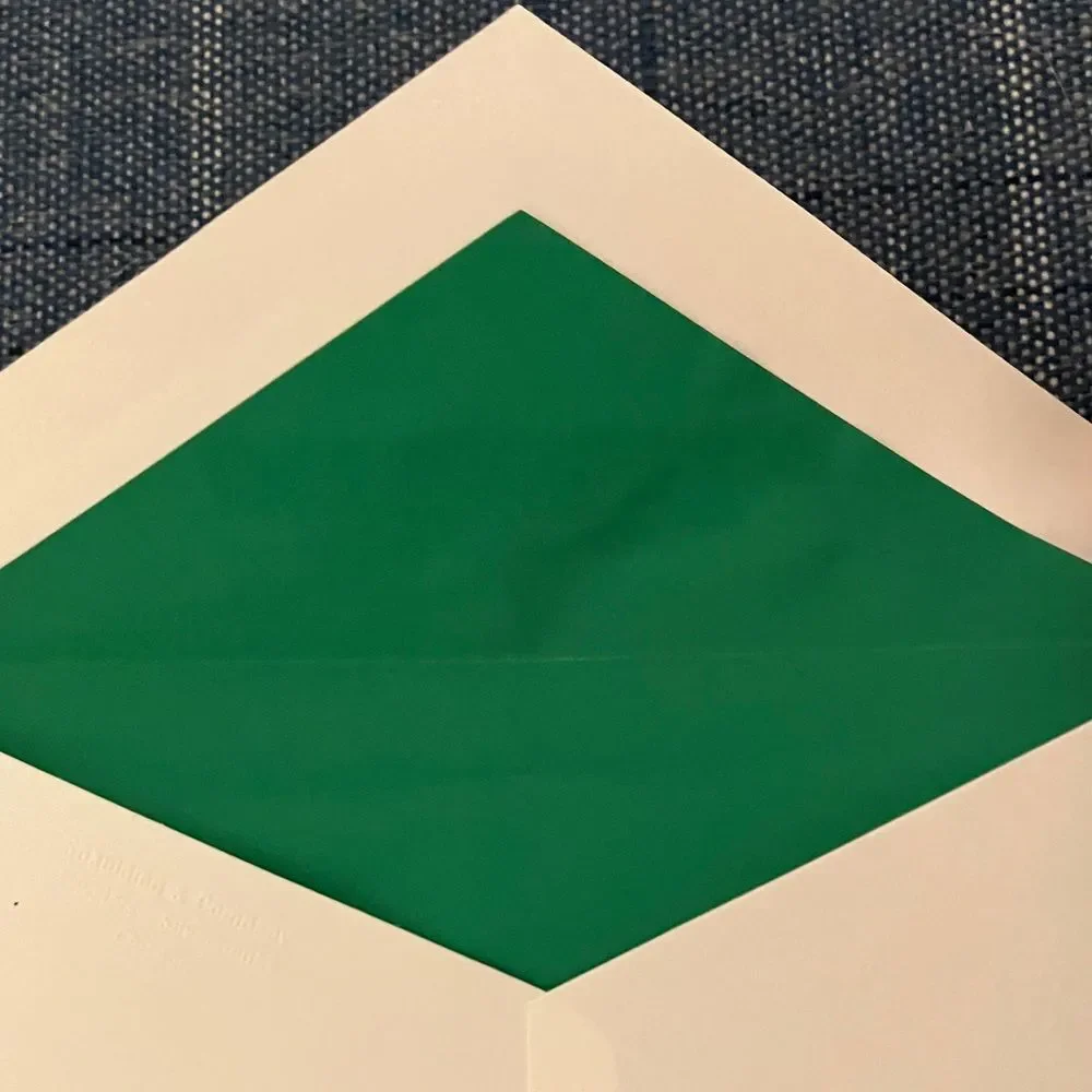 9 White and Green Envelopes